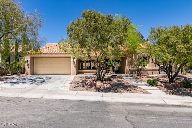 9800 Rosamond Dr, Las Vegas, NV 89134 - obstructed view of property featuring an attached garage, concrete driveway, stucco siding, and a tiled roof
