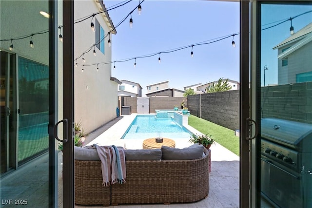 3369 Ponicelli Ln, Henderson, NV 89044 - view of pool featuring a fenced backyard, a patio, and a grill