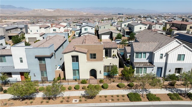 3369 Ponicelli Ln, Henderson, NV 89044 - view of front of house featuring a residential view, stucco siding, and a mountain view