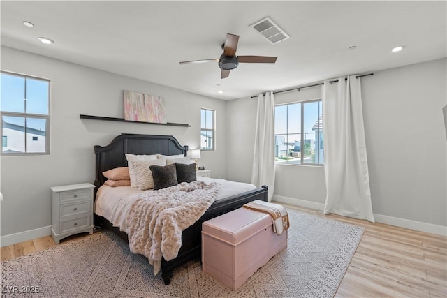 3369 Ponicelli Ln, Henderson, NV 89044 - bedroom with light wood-type flooring, recessed lighting, and a ceiling fan
