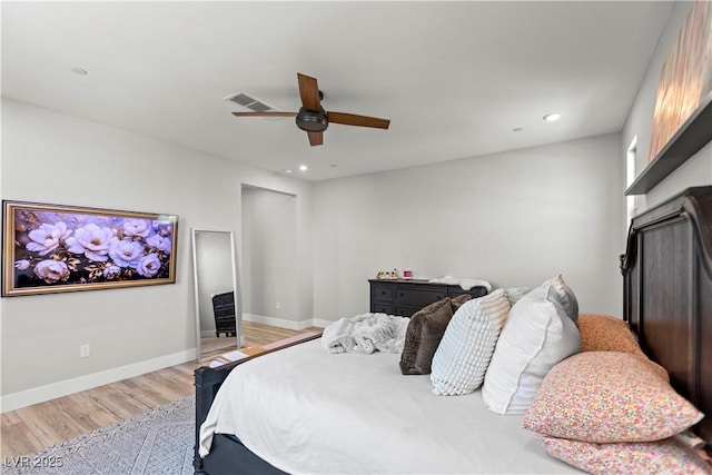 3369 Ponicelli Ln, Henderson, NV 89044 - bedroom with light wood-style floors, recessed lighting, and a ceiling fan
