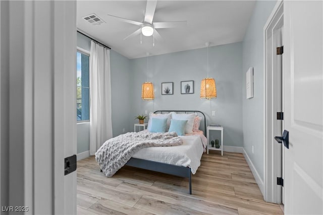 3369 Ponicelli Ln, Henderson, NV 89044 - bedroom with light wood-style floors and ceiling fan