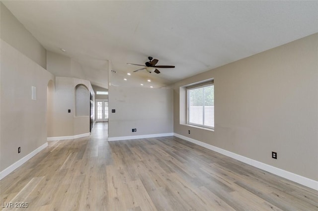 87 Ginger Lily Ter, Henderson, NV 89074 - unfurnished room featuring ceiling fan, lofted ceiling, light wood-type flooring, recessed lighting, and arched walkways