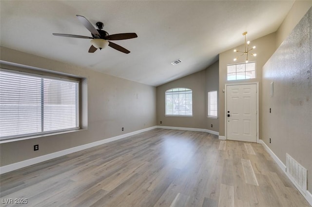 87 Ginger Lily Ter, Henderson, NV 89074 - entrance foyer featuring a chandelier, light wood finished floors, a ceiling fan, and high vaulted ceiling