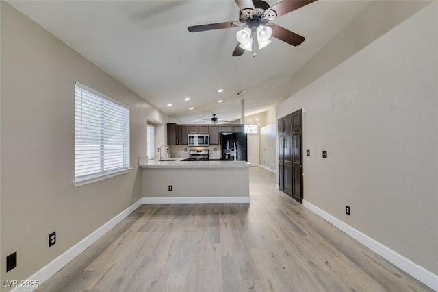 87 Ginger Lily Ter, Henderson, NV 89074 - unfurnished living room featuring a ceiling fan, light wood-style floors, and recessed lighting