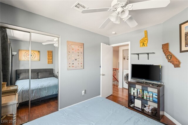 10253 Martinsburg Ct, Las Vegas, NV 89183 - bedroom featuring wood finished floors, ceiling fan, washer / dryer, and a closet