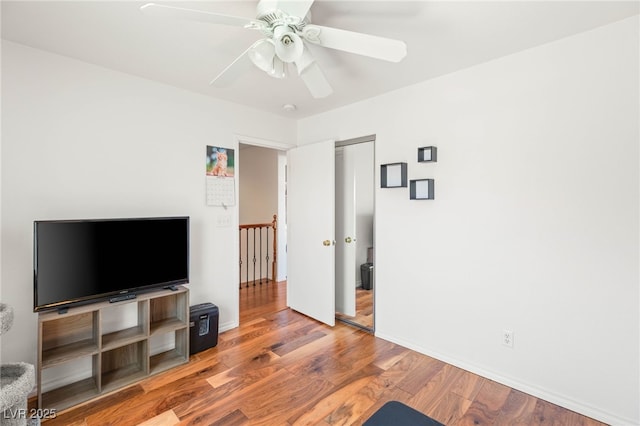 10253 Martinsburg Ct, Las Vegas, NV 89183 - living room featuring ceiling fan and wood finished floors