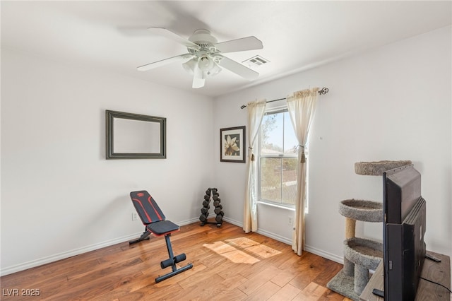 10253 Martinsburg Ct, Las Vegas, NV 89183 - workout area with ceiling fan and light wood-style floors