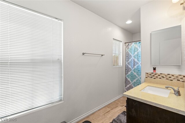 10253 Martinsburg Ct, Las Vegas, NV 89183 - bathroom with vanity, tasteful backsplash, recessed lighting, and a shower with shower curtain