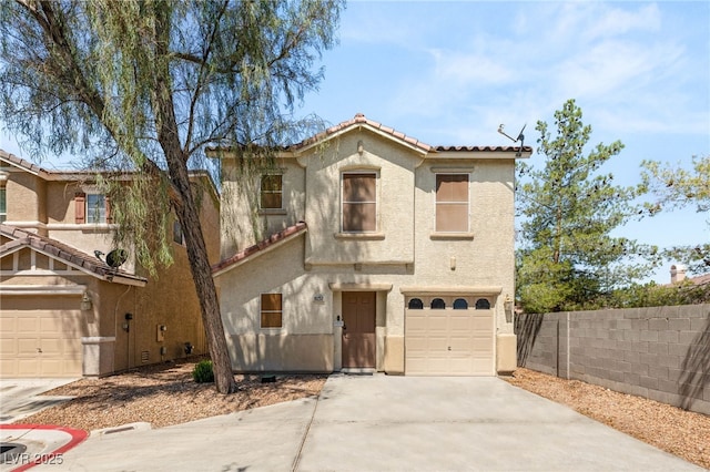 10253 Martinsburg Ct, Las Vegas, NV 89183 - mediterranean / spanish home with driveway, stucco siding, a tile roof, and an attached garage