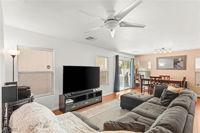 10253 Martinsburg Ct, Las Vegas, NV 89183 - living room with wood finished floors and a ceiling fan