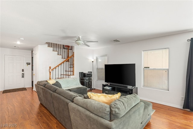 10253 Martinsburg Ct, Las Vegas, NV 89183 - living room with stairway, wood finished floors, and ceiling fan