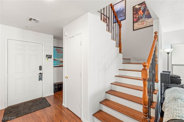 10253 Martinsburg Ct, Las Vegas, NV 89183 - entryway with wood finished floors and stairway