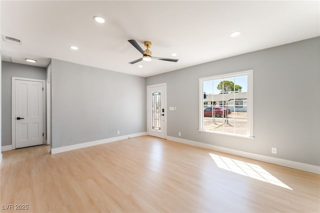 915 Melrose Dr, Las Vegas, NV 89101 - spare room featuring light wood-style flooring, a ceiling fan, and recessed lighting
