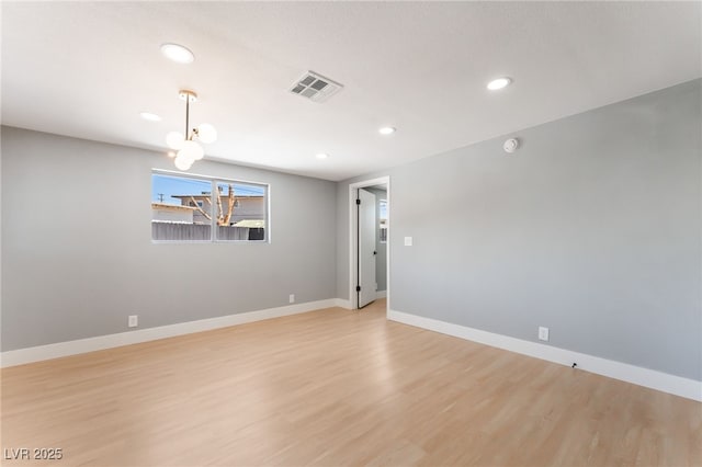 915 Melrose Dr, Las Vegas, NV 89101 - spare room with light wood-style flooring, recessed lighting, and a smoke detector