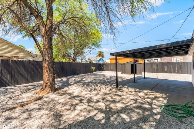 915 Melrose Dr, Las Vegas, NV 89101 - fenced backyard with a shed and a patio area