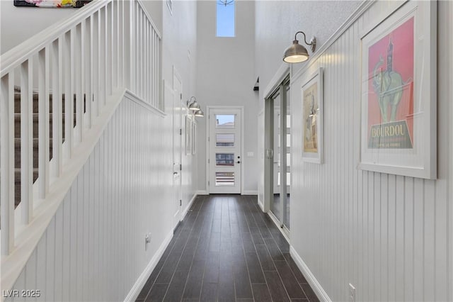 6338 Skystone St, Las Vegas, NV 89135 - foyer entrance with dark wood finished floors and a towering ceiling