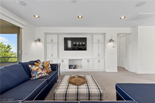 6338 Skystone St, Las Vegas, NV 89135 - living area with light carpet and recessed lighting
