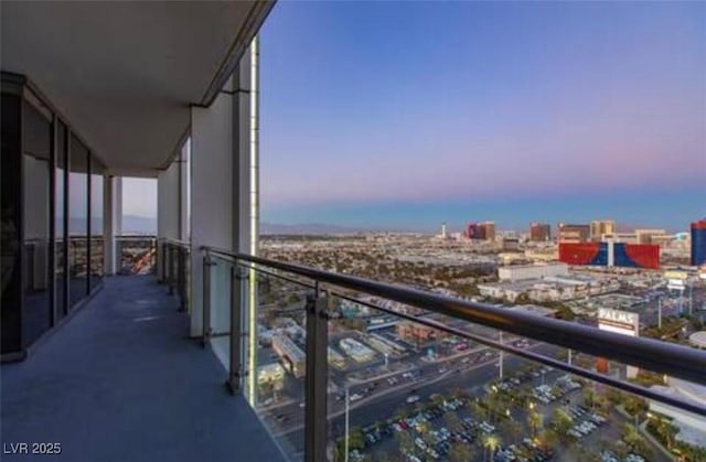 4381 W Flamingo Rd Unit 2902, Las Vegas, NV 89103 - balcony at dusk with a view of city