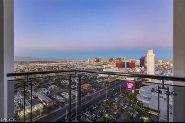 4381 W Flamingo Rd Unit 2902, Las Vegas, NV 89103 - balcony at dusk featuring a view of city