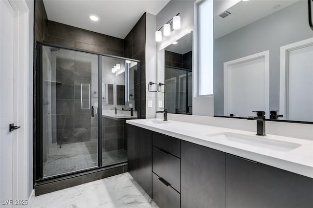 649 Tranquil Jade St, Las Vegas, NV 89138 - bathroom featuring marble finish flooring, double vanity, a shower stall, and recessed lighting