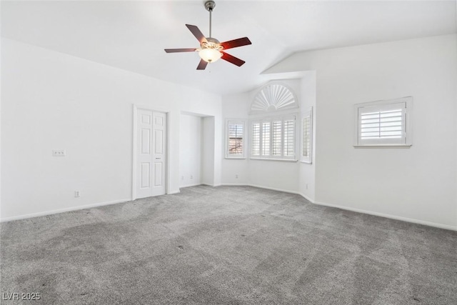 8113 Blue Cascade Ave, Las Vegas, NV 89128 - carpeted empty room featuring healthy amount of natural light, ceiling fan, and lofted ceiling