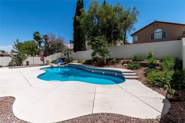 8113 Blue Cascade Ave, Las Vegas, NV 89128 - view of swimming pool featuring a patio and a fenced backyard