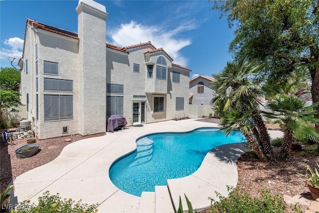 8113 Blue Cascade Ave, Las Vegas, NV 89128 - swimming pool with a patio area