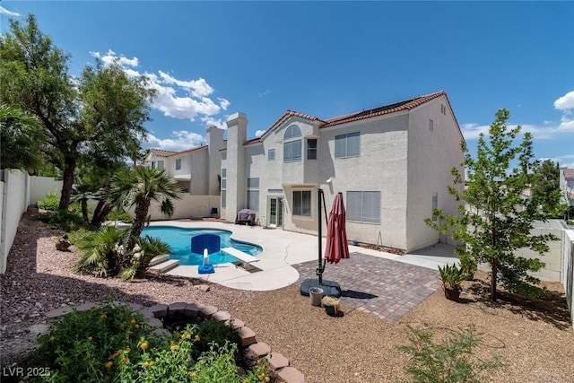 8113 Blue Cascade Ave, Las Vegas, NV 89128 - view of swimming pool with a patio and a fenced backyard