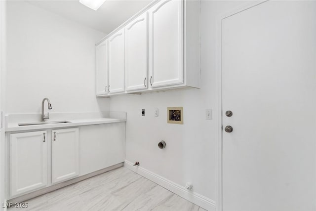 8113 Blue Cascade Ave, Las Vegas, NV 89128 - laundry room featuring gas dryer hookup, cabinet space, washer hookup, electric dryer hookup, and light marble finish floors