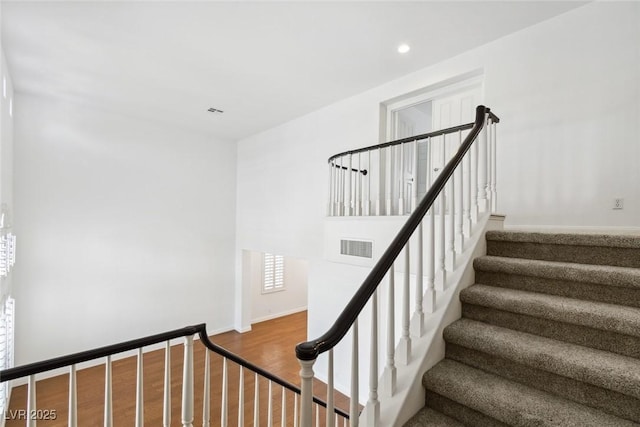8113 Blue Cascade Ave, Las Vegas, NV 89128 - stairs featuring recessed lighting and wood finished floors