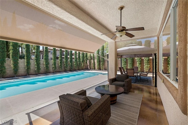 5405 San Bellasera Ct, Las Vegas, NV 89141 - swimming pool featuring a fenced backyard, a ceiling fan, a gazebo, and a patio