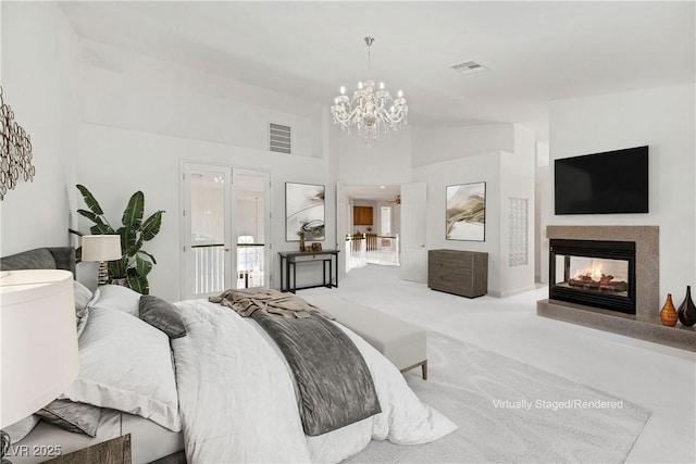 5405 San Bellasera Ct, Las Vegas, NV 89141 - bedroom with a chandelier, carpet flooring, a multi sided fireplace, and a high ceiling