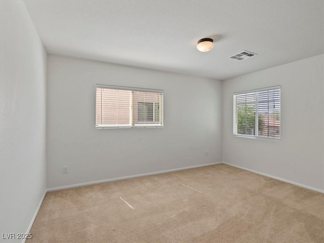 4905 Apache Valley Ave, Las Vegas, NV 89131 - unfurnished room with light carpet and baseboards