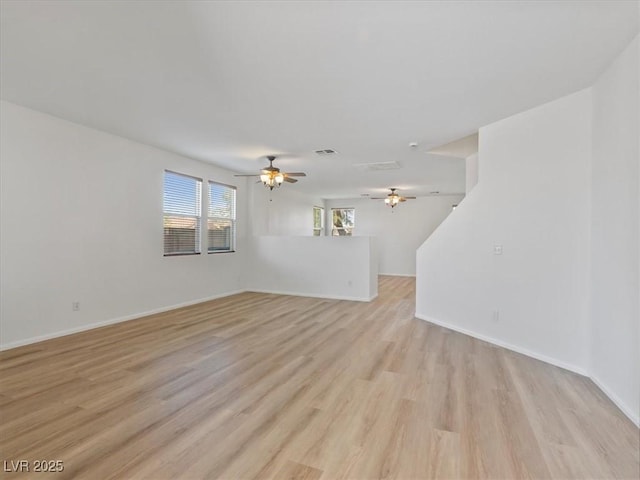 4905 Apache Valley Ave, Las Vegas, NV 89131 - unfurnished living room featuring a ceiling fan and light wood-type flooring