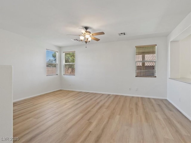 4905 Apache Valley Ave, Las Vegas, NV 89131 - empty room featuring a ceiling fan and light wood-style floors