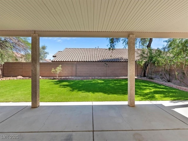 4905 Apache Valley Ave, Las Vegas, NV 89131 - fenced backyard with a patio