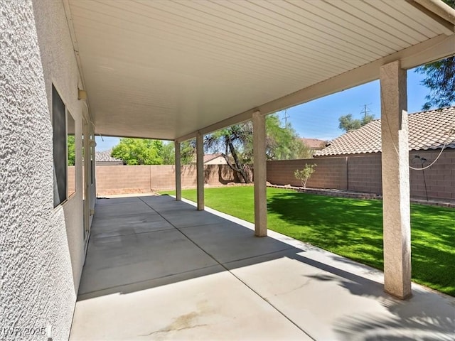 4905 Apache Valley Ave, Las Vegas, NV 89131 - fenced backyard with a patio