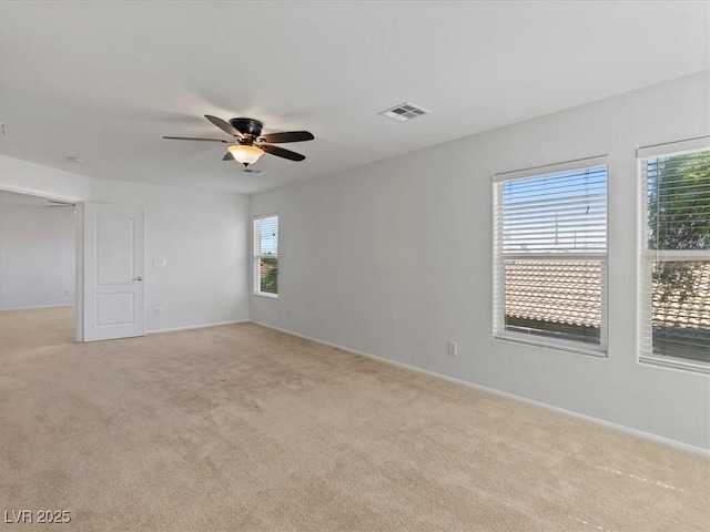 4905 Apache Valley Ave, Las Vegas, NV 89131 - spare room featuring light colored carpet and a ceiling fan