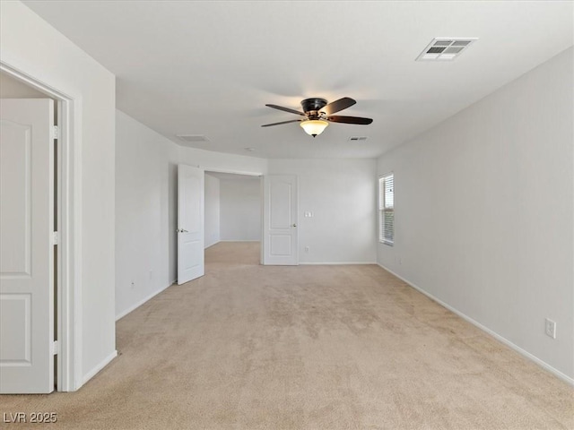 4905 Apache Valley Ave, Las Vegas, NV 89131 - spare room with a ceiling fan and light colored carpet