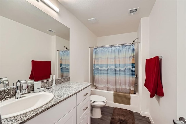 12282 Azure Gate Rd Unit 4, Las Vegas, NV 89183 - bathroom featuring vanity, shower / bath combo with shower curtain, and wood finished floors