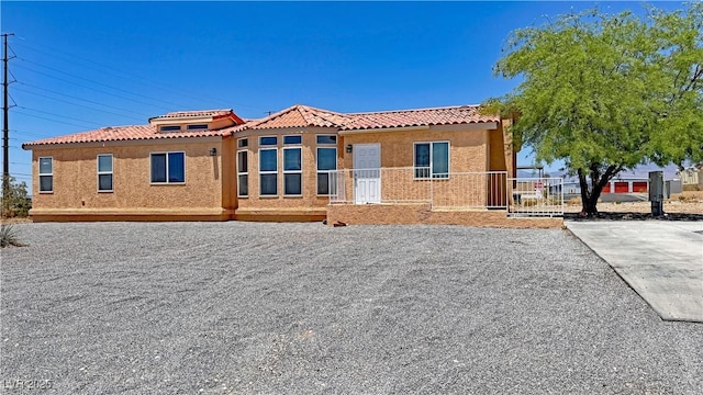 2530 Commercial Dr, Pahrump, NV 89048 - view of front of property featuring a tiled roof and stucco siding