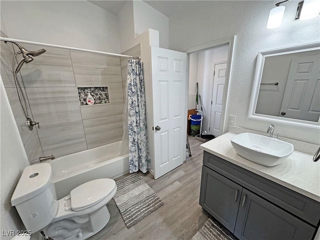 2530 Commercial Dr, Pahrump, NV 89048 - bathroom with vanity, wood finished floors, and shower / bath combination with curtain
