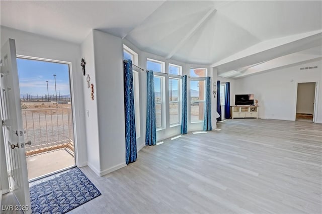 2530 Commercial Dr, Pahrump, NV 89048 - foyer entrance featuring wood finished floors and lofted ceiling
