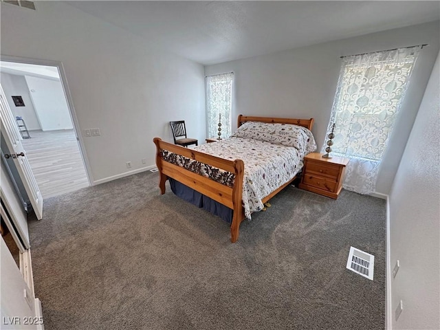 2530 Commercial Dr, Pahrump, NV 89048 - carpeted bedroom featuring baseboards