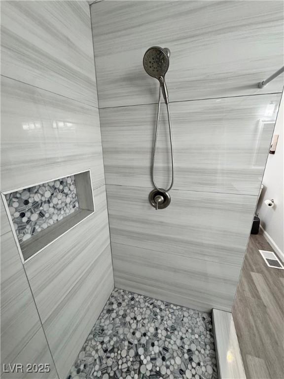 2530 Commercial Dr, Pahrump, NV 89048 - bathroom featuring a tile shower