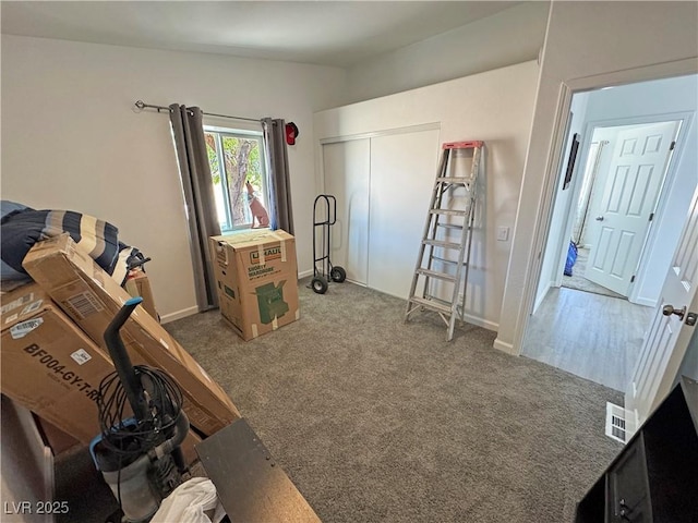 2530 Commercial Dr, Pahrump, NV 89048 - carpeted bedroom with a closet and baseboards