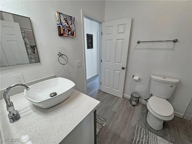 2530 Commercial Dr, Pahrump, NV 89048 - full bathroom with vanity and wood finished floors