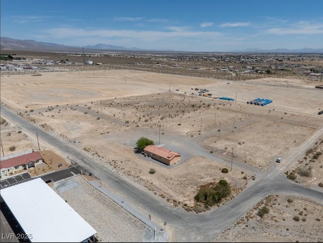 2530 Commercial Dr, Pahrump, NV 89048 - aerial view of sparsely populated area with a desert landscape and mountains