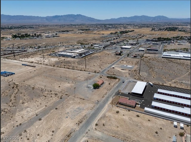 2530 Commercial Dr, Pahrump, NV 89048 - aerial view of sparsely populated area featuring a mountain backdrop